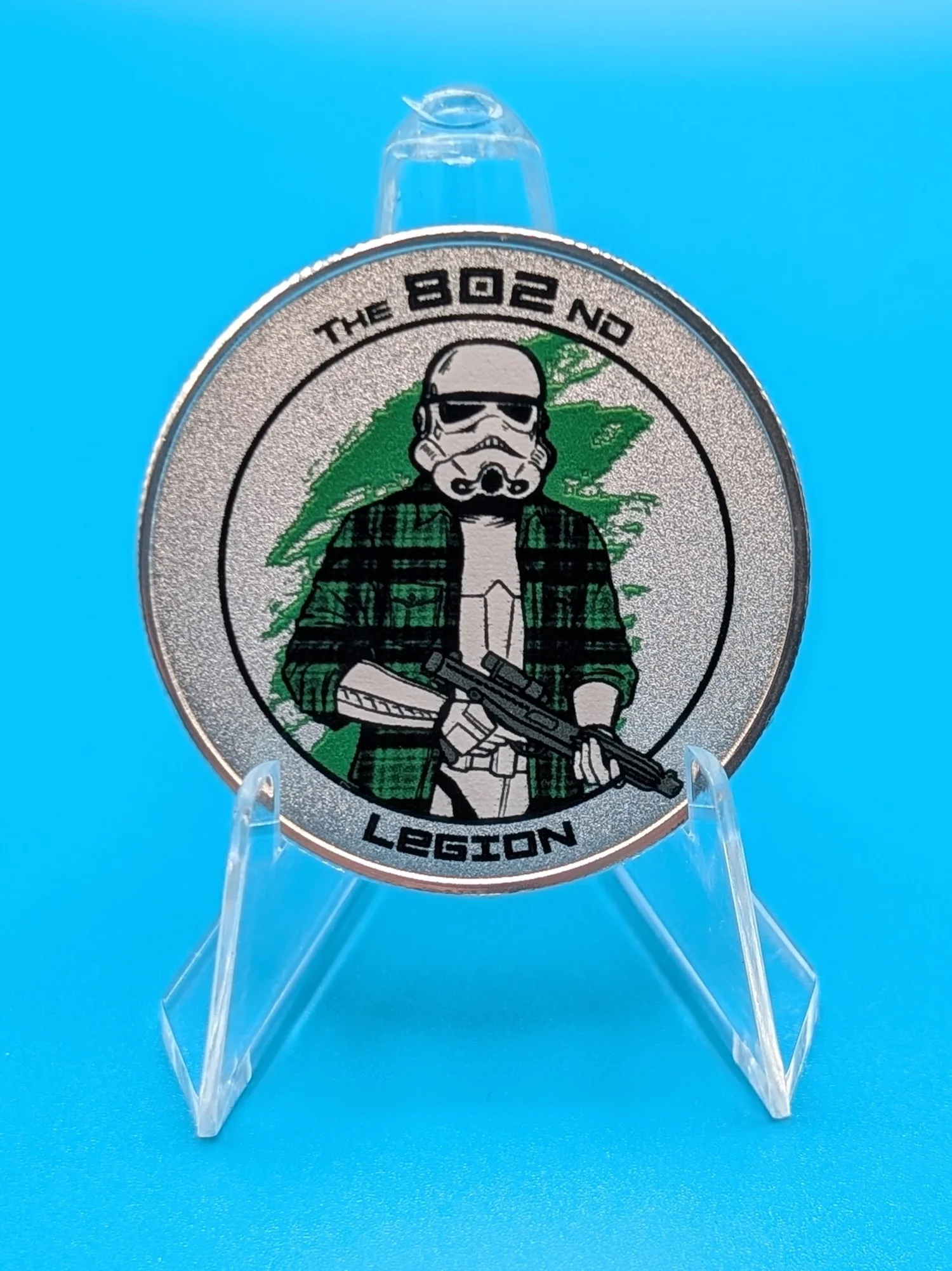 UV-printed metal challenge coin reading "The 802nd Legion" with a flannel-clad stormtrooper illustration.
